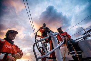 Leg 7 to Lisbon onboard Team Alvimedica. Day 01. Seb Marsset driving with Alberto Bolzan (R) trimming and Nick Dana on standby to grind (L). The fleet pushes east in chase of the warm Gulf Stream and it's complex currents,but a difficult sea state and upwind conditions make life uncomfortable. photo copyright  Amory Ross / Team Alvimedica taken at  and featuring the  class
