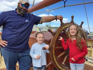 Pictured (from left) are OHP Able Seaman Carmine Russo (Clearwater, Fla.) with visitors Laila and Georgia Hekking (Newport). photo copyright OHPRI taken at  and featuring the  class