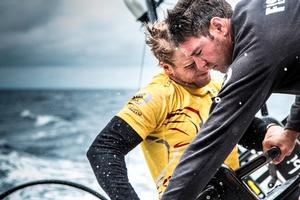 Simon 'SiFi' Fisher and Luke 'Parko' Parkinson battle spray in the midst of a sail change on Leg 7 to Lisbon - Volvo Ocean Race 2015 photo copyright Matt Knighton/Abu Dhabi Ocean Racing taken at  and featuring the  class