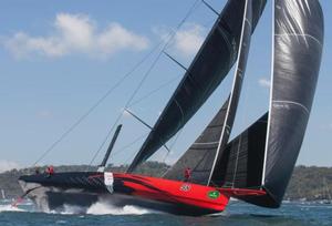 Skippered by Ken Read, Jim and Kristy Hinze Clark's 100ft Maxi, Comanche set an unofficial record for the the fastest boat past the first turning mark in the 2014 Rolex Sydney Hobart Race and was second across the line in Hobart photo copyright  Rolex/Daniel Forster http://www.regattanews.com taken at  and featuring the  class