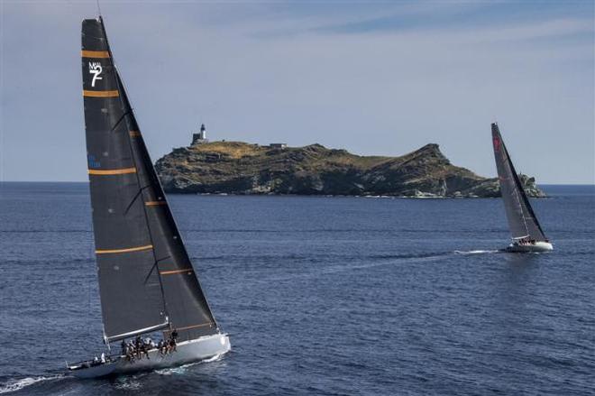 CAOL ILA R, USA and MOMO, IVB reach the Giraglia Rock - 2015 Giraglia Rolex Cup ©  Rolex / Carlo Borlenghi http://www.carloborlenghi.net