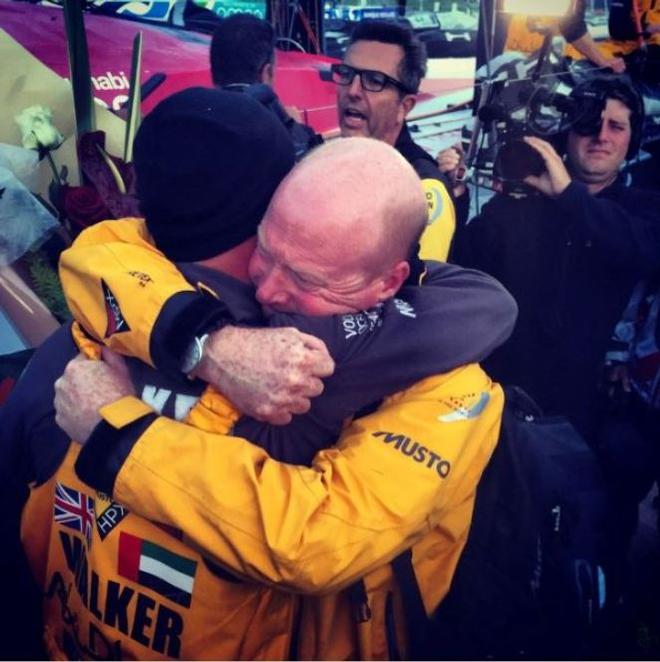 Skipper Ian Roman and Jamie Boag celebrate at the pontoon - Volvo Ocean Race 2015 ©  Justin Chisholm / Abu Dhabi Ocean Racing http://www.volvooceanrace.com