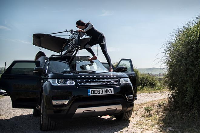 Hannah prepares her Moth ahead of the challenge, after driving it across the Channel Tunnel on top of her Range Rover Sport. © Anthony Cullen