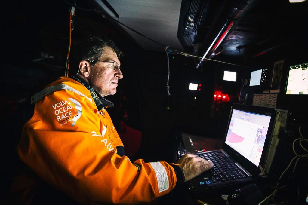June 17, 2015. Leg 9 to Gothenburg onboard Team Alvimedica. Day 1. Free from the Bay of Biscay the fleet rounds Brest on the way to the English Channel, all within close proximity. Will Oxley hard at work in the nav station analyzing the English Channel's TSS zone. ©  Amory Ross / Team Alvimedica