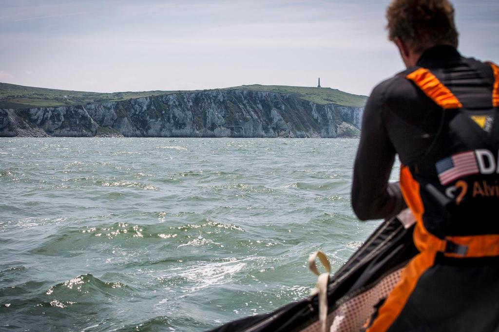 June 18, 2015. Leg 9 to Lorient onboard Team Alvimedica. Day 2. A windy night of sailing and a decision to stay south of the TSS traffic separation scheme sees another day of sailing along the French coast on the north towards The Hague. Nick Dana moving the stack before a tack off the French coastline of the English Channel. ©  Amory Ross / Team Alvimedica