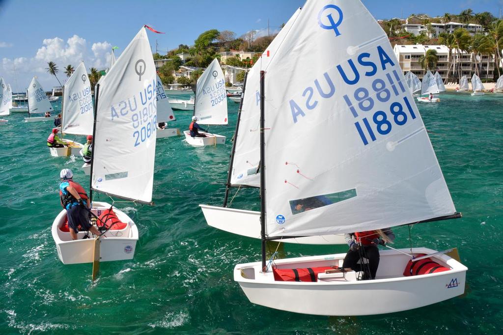 Optimists sailing off from the beach at the St. Thomas Yacht Club. IOR/Dean Barnes © Dean Barnes