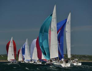 The J/105 Fleet on a run in ideal racing conditions - 2015 Block Island Race Week photo copyright PhotoBoat.com taken at  and featuring the  class