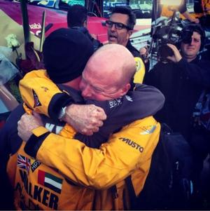 Skipper Ian Roman and Jamie Boag celebrate at the pontoon - Volvo Ocean Race 2015 photo copyright  Justin Chisholm / Abu Dhabi Ocean Racing http://www.volvooceanrace.com taken at  and featuring the  class