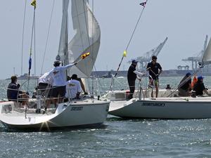 LBYC's Dustin Durant (at helm) raises flag asking for a penalty against SFYC's Shawn Bennett, after Bennett makes contact with Durant's boat during the 2015 San Francisco Perpetual Challenge Cup match race regatta. photo copyright Rick Roberts  taken at  and featuring the  class