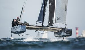 Sultinate of Oman GC32 rounding the Needles this morning - 2015 JP Morgan Round the Island Race photo copyright Lloyd Images taken at  and featuring the  class
