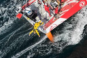 François Gabart MACIF trimaran skipper shows everyone how it's done as he jumps from Dongfeng photo copyright  Ainhoa Sanchez/Volvo Ocean Race taken at  and featuring the  class