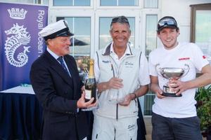 After three days of highly competitive racing on the Solent, Peter Morton's JND 35, Salvo was announced winners and class winners in IRC Three. RORC Commodore, Michael Boyd presents them with their spoils - 2015 IRC National Championship photo copyright Paul Wyeth / www.pwpictures.com http://www.pwpictures.com taken at  and featuring the  class