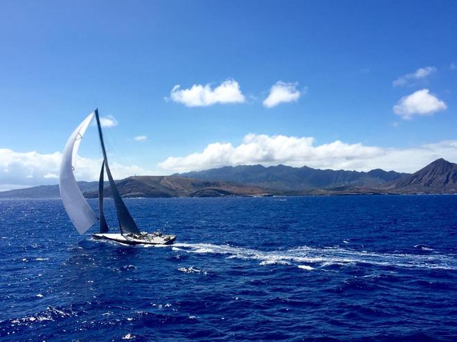 RIO100 crosses the finish line off Diamond Head, Hawaii © SW