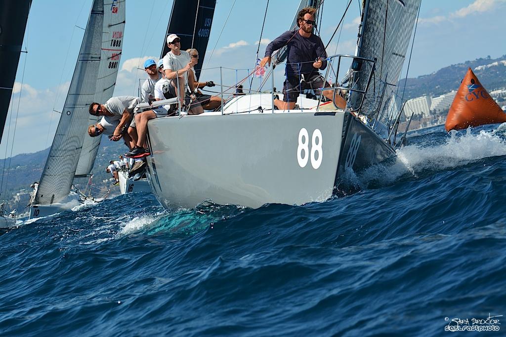 Skipper Zoltan Zatinszky and the White Knight team had their best day of the regatta.  © Sara Proctor http://www.sailfastphotography.com