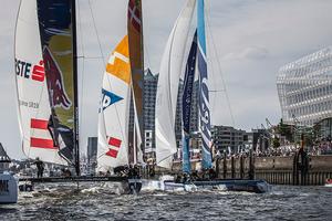SAP Extreme Sailing Team, The Wave, Muscat and Red Bull Sailing Team race downwind photo copyright Jesus Renedo / OC Sport taken at  and featuring the  class