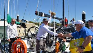Stephen Proud skipper of Swish receiving his pineapple & XXXX 2014 B2K race photo copyright Keppel Bay Marina taken at  and featuring the  class