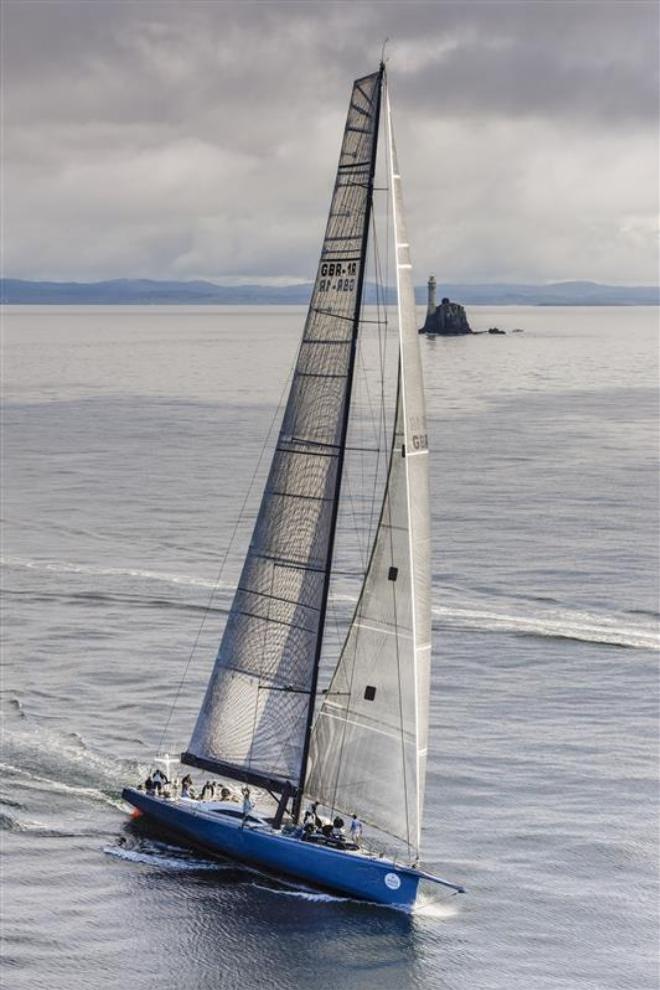 Mike Slade's Maxi LEOPARD (GBR) passing the Fastnet Rock - 2015 Rolex Fastnet Race &copy;  Rolex/ Kurt Arrigo http://www.regattanews.com