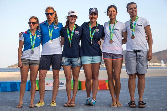 Women's 470 medalists, Olympic Test Event: Hannah Mills and Saskia Clark (Great Britain), Annie Haeger and Briana Provancha (United States), Jo Aleh and Olivia Powrie (New Zealand). ©  Richard Langdon http://www.oceanimages.co.uk