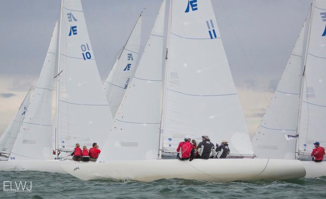 Jamie Clarke of the organising club calls “starboard!” on the fleet, just 50 metres from the pin end of the finishing line. © Emma Louise Wyn Jones Photography
