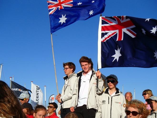 Flag waving members of the Australian team,  with Sam King at the centre. - 2015 Laser 4.7 Youth World Championships © International Laser Class Association http://www.laserinternational.org