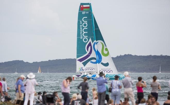 Sultanate of Oman MOD70 Trimaran skippered by Sidney Gavignet (FRA) shown here at the start - 2015 Rolex Fastnet Race © Lloyd Images