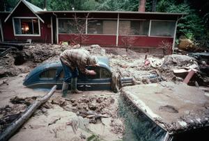 A car was buried in a mudslide possibly triggered by rain related to an El Niño pattern in January 1982.  While an El Niño can bring rain to California, it may not bring a lot of snow. photo copyright Jim Sugar taken at  and featuring the  class