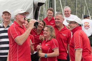 Wild Rose IRC div C winners Roger Hickman drinking champagne - 2015 Audi Hamilton Island Race Week photo copyright Andrea Francolini taken at  and featuring the  class