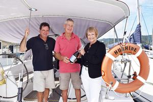 Adrian Bram (ABRW), Huahine owner Nick Smail and Jan Clifford (Whitsunday Regional Council) photo copyright Charlotte Lam / Whitsunday Times taken at  and featuring the  class