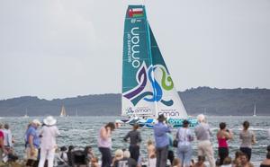 Sultanate of Oman MOD70 Trimaran skippered by Sidney Gavignet (FRA) shown here at the start - 2015 Rolex Fastnet Race photo copyright Lloyd Images taken at  and featuring the  class