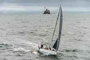Sarabande racing in IRC 3 rounding the Fastnet Rock - 2015 Rolex Fastnet Race photo copyright  Rolex/ Kurt Arrigo http://www.regattanews.com taken at  and featuring the  class