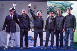RORC Commodore, Michael Boyd presents the Iolaire Cup to IRC 4 winner, Gerard Quenot's JPK 10.10, Alkaid 111 - Nautistock - 2015 Rolex Fastnet Race photo copyright  ELWJ Photography taken at  and featuring the  class
