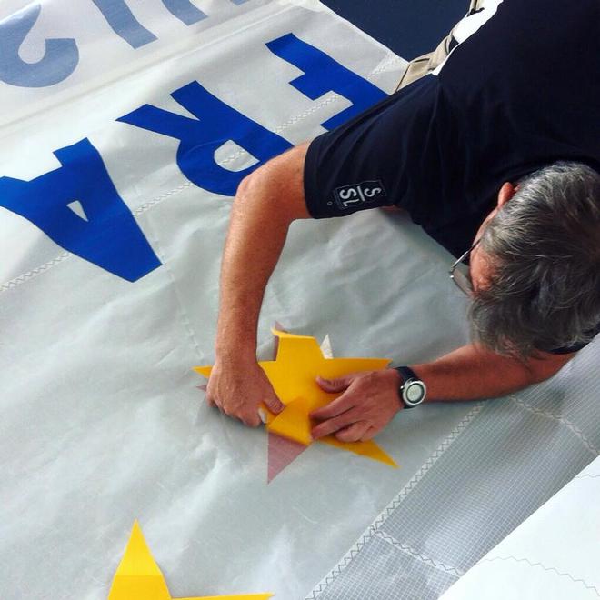 Affixing the Gold Star - Star Sailors League 2015 Lake Neuchatel, Switzerland © Star Sailors League http://starsailors.com/