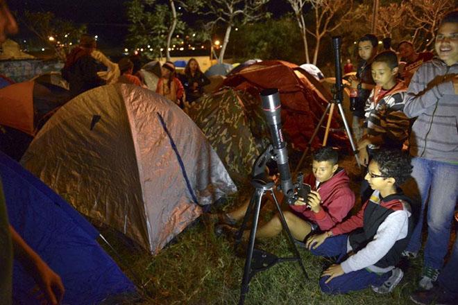 Unlike a solar eclipse, which creates the impression of a bright 'ring' of light as the Moon passes before our star, there is no danger in watching lunar spectacle with the naked eye, experts say © AFP Photo / Raul Arboleda