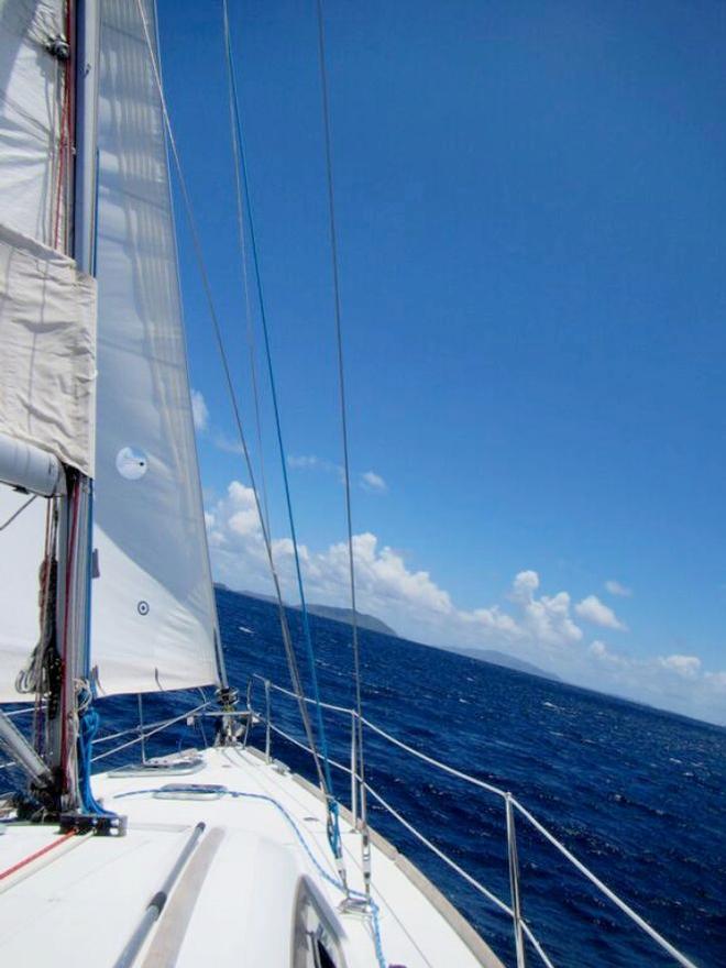 Sailing across the Sir Francis Drake Channel to reach George Dog for an afternoon snorkel © Karen E. Lile