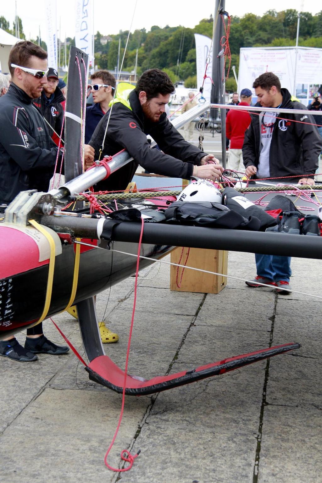 Boats are being prepared, check the shape of the foils, that V serve as a self regulating way to maintain the boat level with the water surface. photo copyright Jean-Philippe Jobé taken at  and featuring the  class