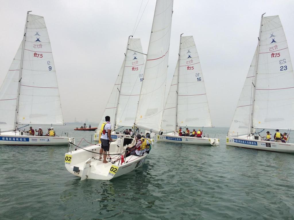 That's never going to fit! - China Club Challenge Cup 2015 photo copyright Al Skinner taken at  and featuring the  class
