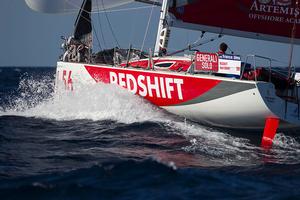 Redshift skipper Nick Cherry surfing downwind towards Menorca photo copyright Alexis Courcoux taken at  and featuring the  class