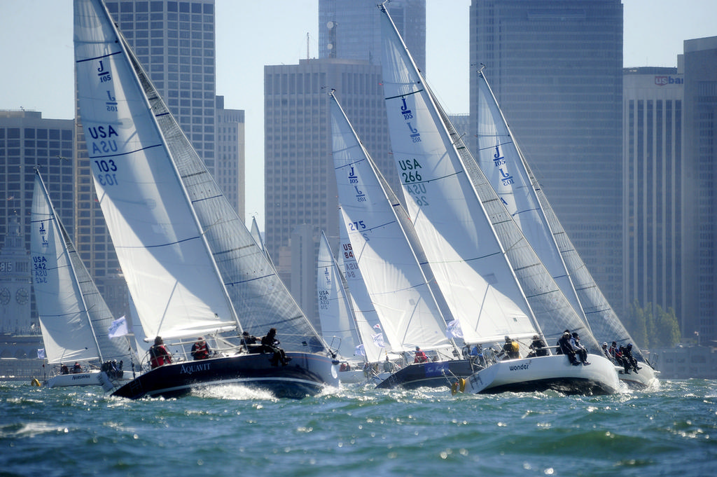 J-105 fleet battling after the start and putting on a show for the City's financial district employees who are lucky enough to have a Bay view window. © Chuck Lantz http://www.ChuckLantz.com