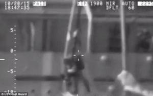 Coast Guard video taken south of Alaska shows the mariner clinging to the rigging pole at the bow of his stricken boat, riding wave after wave a few feet from the hull of the Tor Viking photo copyright U.S. Coast Guard taken at  and featuring the  class