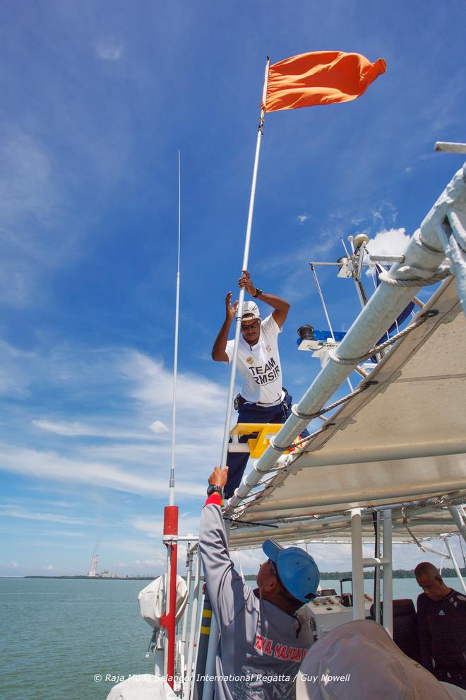 Raising the flag. Raja Muda Selangor International Regatta 2015 © Guy Nowell / RMSIR