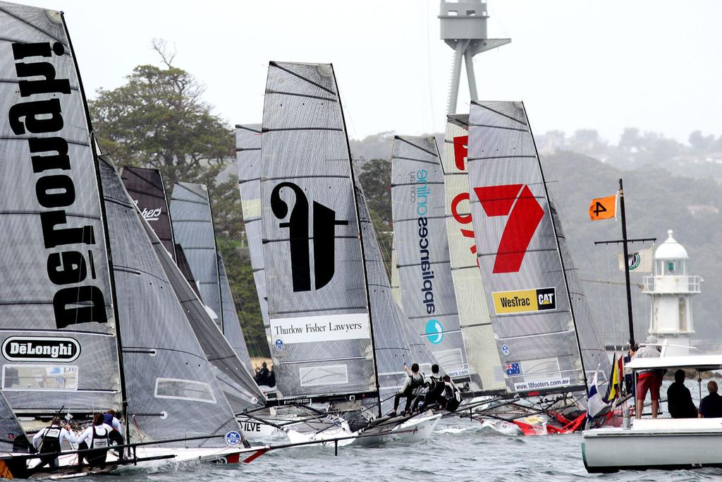 Gotta Love It 7 a fraction early at the start photo copyright Frank Quealey taken at  and featuring the  class