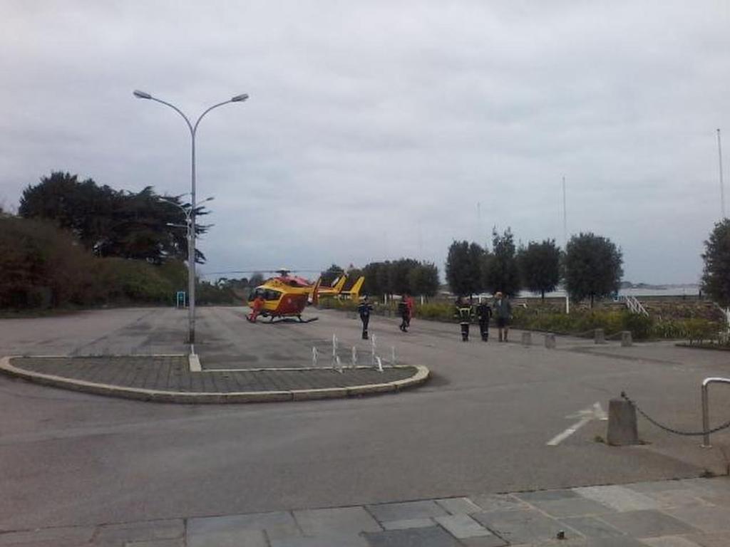 A helicopter is readied to take Franck Cammas to a nearby hospital - ouest-france.fr photo copyright SW taken at  and featuring the  class