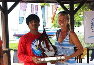 Annika presents the trophy for most improved sailor in Barbados photo copyright Annika Fredriksson taken at  and featuring the  class