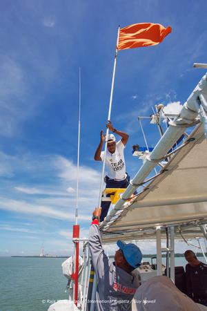 Raising the flag. Raja Muda Selangor International Regatta 2015 photo copyright Guy Nowell / RMSIR taken at  and featuring the  class