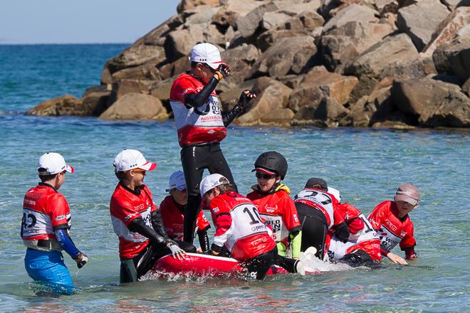 Busting a move on board a paddle board whilst waiting for the breeze to settle in. - 2015 Bic O'pen World Cup ©  Alex McKinnon Photography http://www.alexmckinnonphotography.com