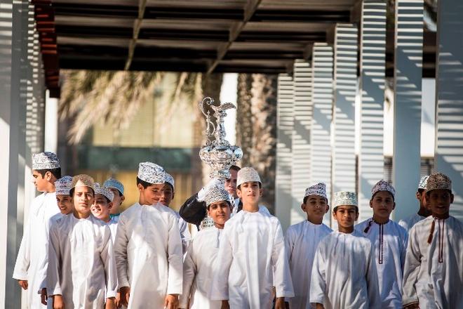 The Americas Cup Trophy in Muscat, Oman. Shown here with a group of local schoolboys to celebrate and highlight The Louis Vuitton Americas Cup World Series coming to Oman in February 2016 © Mark Lloyd http://www.lloyd-images.com