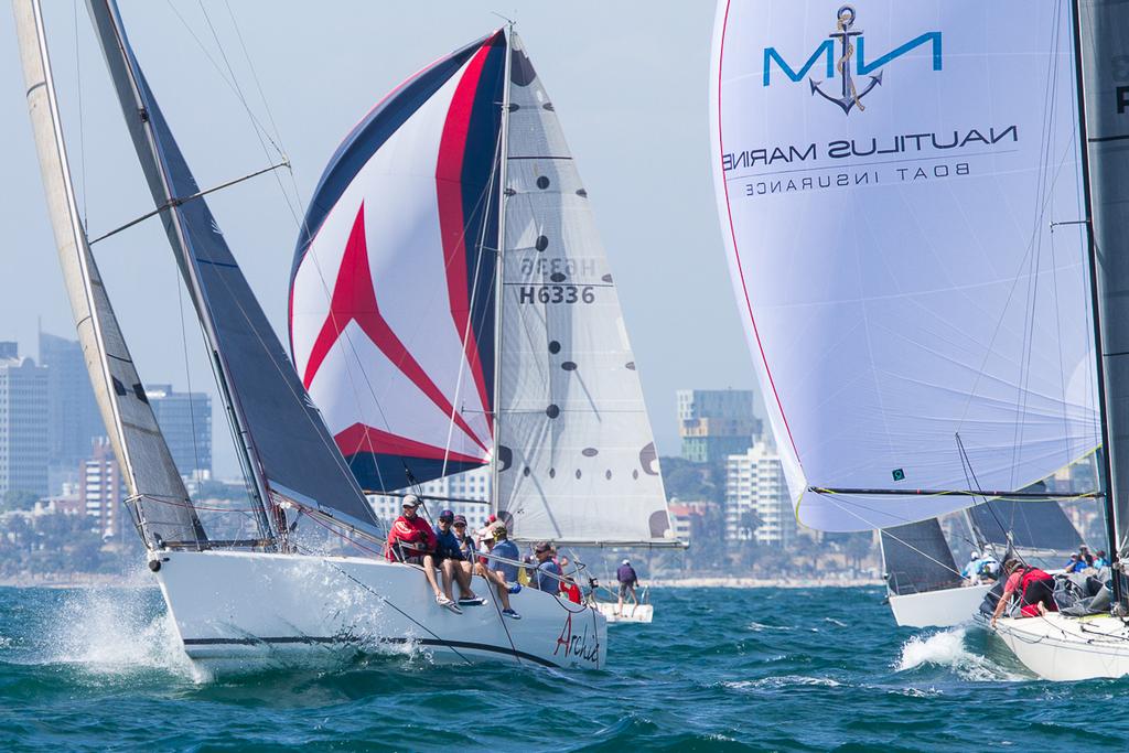 Archie heads back to the weather mark with St Kilda in the background - Club Marine Series Round Three ©  Alex McKinnon Photography http://www.alexmckinnonphotography.com