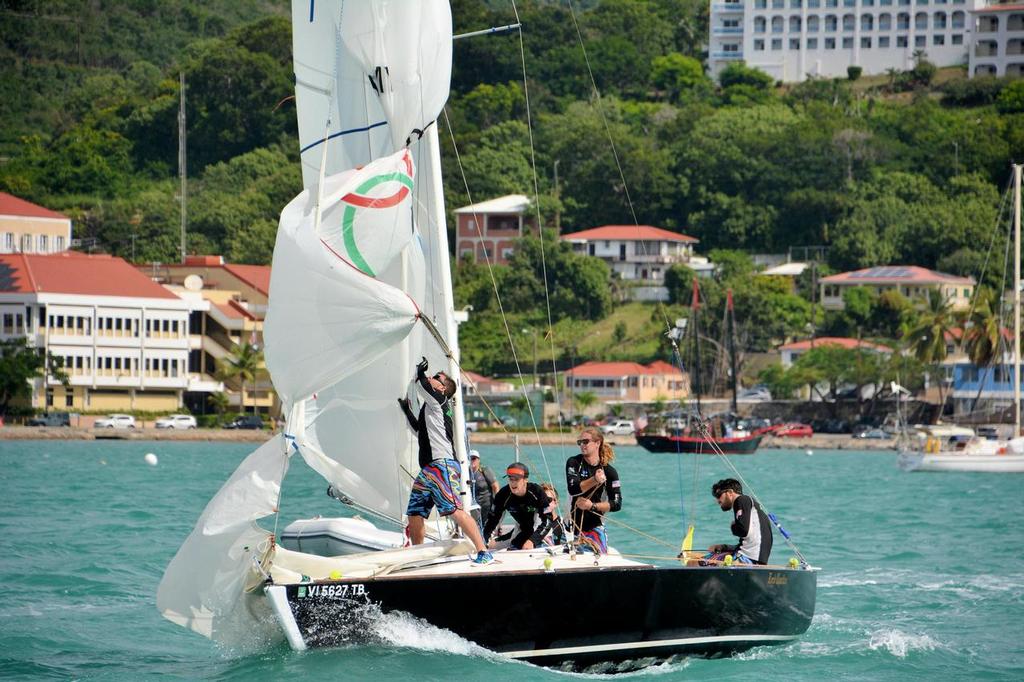 The USA's Chris Poole and his team are quick on the spinnaker in the CAMR. Credit: Dean Barnes © Dean Barnes