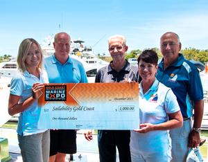 Expo event and marketing manager Emma Brown and Expo chairman Brett Thurley present a $1000 donation to Sailability Gold Coast past president Paul Dinniss, current president Jenny Ponting and past president Peter Board photo copyright Gold Coast Marine Expo www.gcmarineexpo.com.au taken at  and featuring the  class