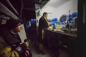 Christophe Espagnon and Xavier Revil on the standby watch in the kitchen area on Spindrift 2 photo copyright Spindrift Racing taken at  and featuring the  class